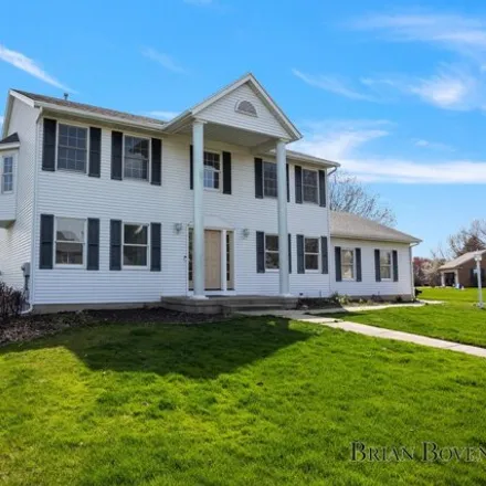Buy this 4 bed house on 1516 Penncross Drive Southeast in Gaines Charter Township, MI 49316