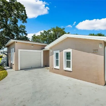 Buy this 4 bed house on Floramar Terrace in Elfers, FL 34652