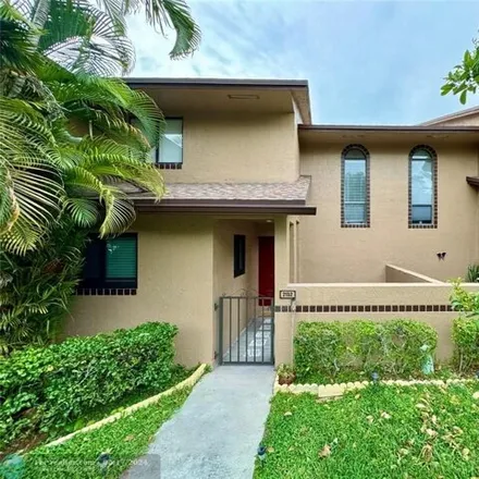 Rent this 2 bed townhouse on 2146 Northwest 39th Avenue in Coconut Creek, FL 33066