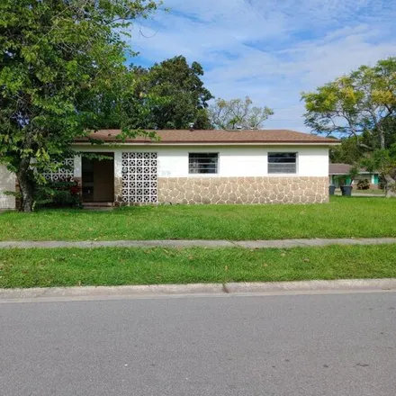 Rent this 3 bed house on 2776 Mars Drive in Titusville, FL 32796