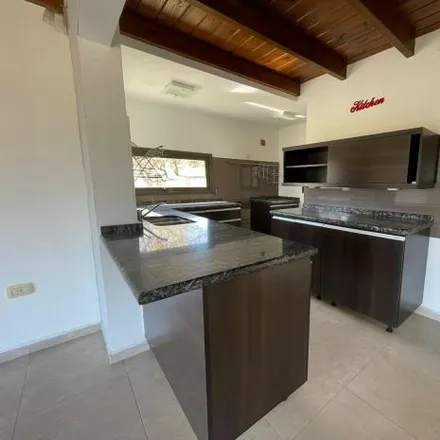 Rent this 3 bed house on unnamed road in Departamento Santa María, Villa Parque Santa Ana