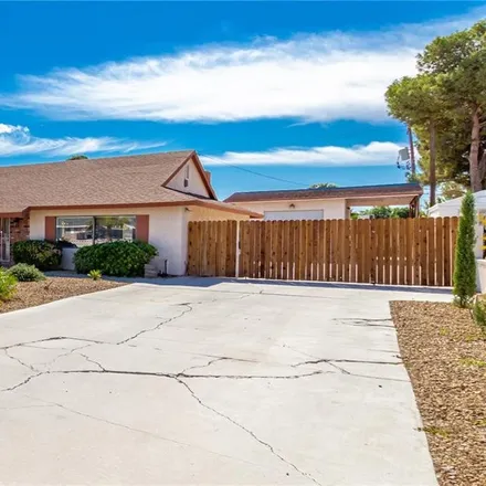 Buy this 4 bed house on 5353 West Eugene Avenue in Las Vegas, NV 89108