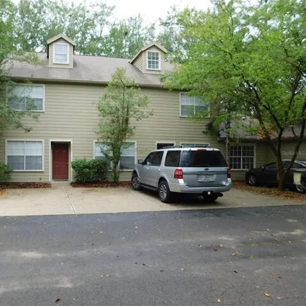 Rent this 2 bed townhouse on 9754 Sw 52nd Rd in Gainesville, Florida
