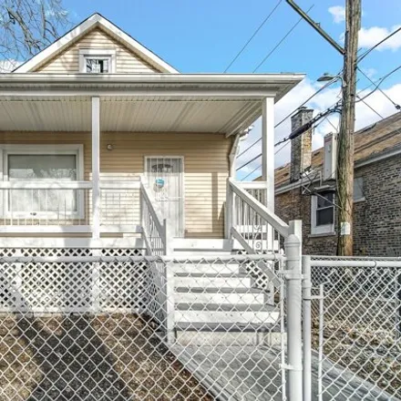 Buy this 3 bed house on 1014 West 57th Street in Chicago, IL 60636