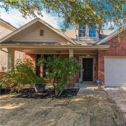 Rent this 4 bed house on 5101 Bluestar Drive in Austin, TX 78739