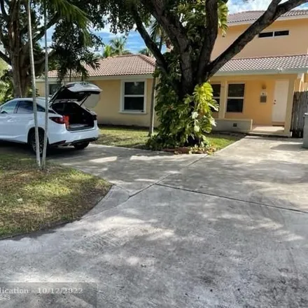 Rent this 3 bed house on 412 Northeast 12th Avenue in Pompano Beach, FL 33060