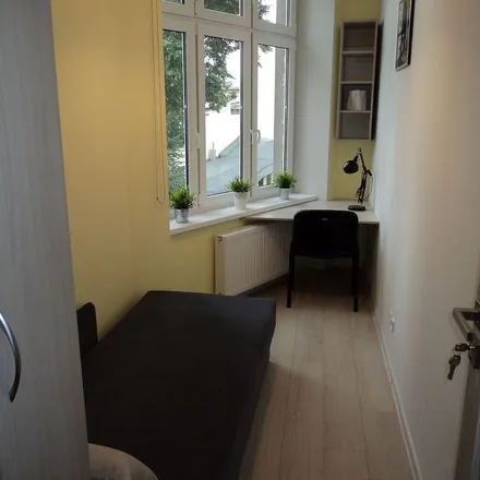 Rent this 8 bed apartment on Jana Kilińskiego 114 in 90-013 Łódź, Poland