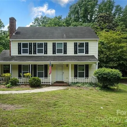 Buy this 4 bed house on 5129 Macandrew Drive in Charlotte, NC 28226