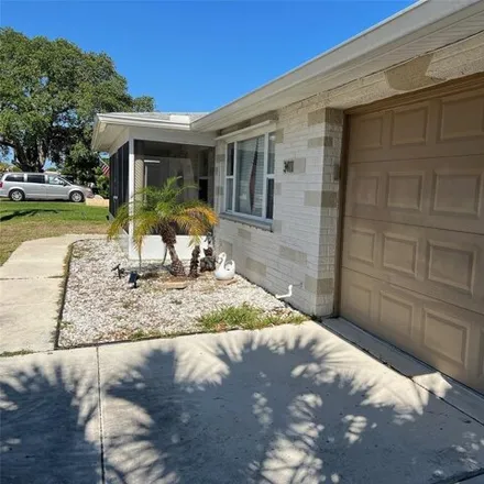 Buy this 3 bed house on 3405 Trask Drive in Holiday, FL 34691