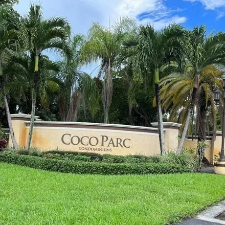 Rent this 2 bed condo on Northwest 7th Manor in Lakewood East, Coconut Creek