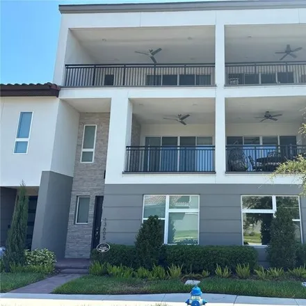 Rent this 3 bed townhouse on Royston Alley in Orange County, FL 32832