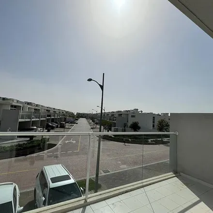 Rent this 3 bed townhouse on unnamed road in Akoya Albizia, Damac Hills 2