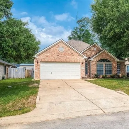 Buy this 3 bed house on 28813 Hidden Cove Drive in Montgomery County, TX 77354