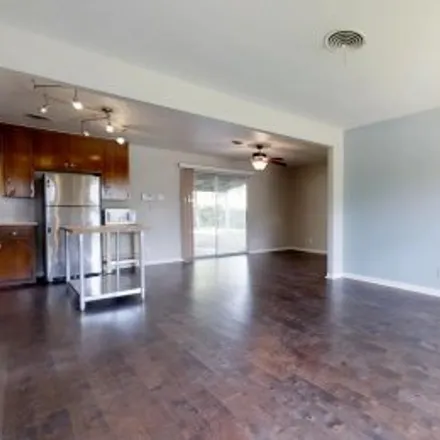 Rent this 3 bed apartment on 5202 Ravensdale Lane in Ridgetop Gardens, Austin