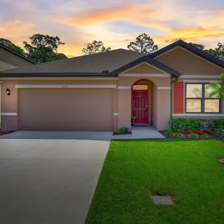 Buy this 3 bed house on Mineral Loop Drive Northwest in Palm Bay, FL 32908