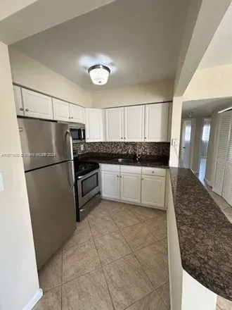 Rent this 2 bed condo on Azul at Kimberly Lakes in 4051 Northeast 13th Avenue, Oakland Park