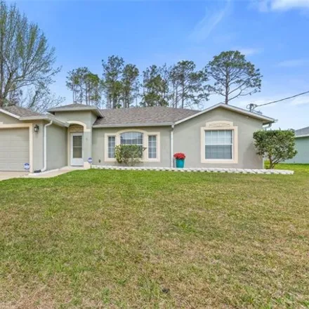 Buy this 5 bed house on 115 Red Mill Drive in Palm Coast, FL 32164