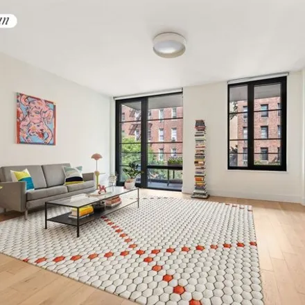 Buy this studio condo on 272 Webster Avenue in New York, NY 11230