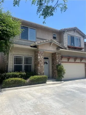 Rent this 4 bed house on 9470 Arbor Lane in Cypress, CA 90630