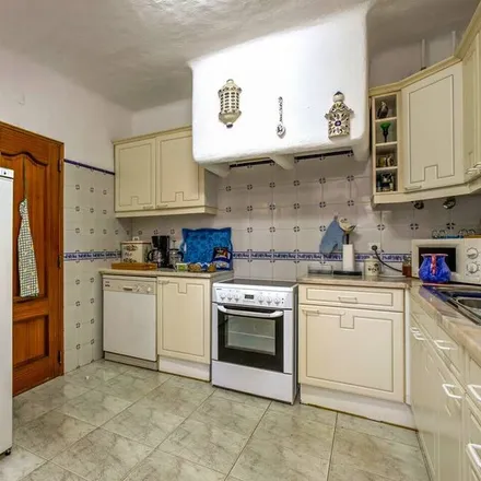 Rent this 4 bed house on Carvoeiro in Estrada do Farol, 8400-526 Carvoeiro