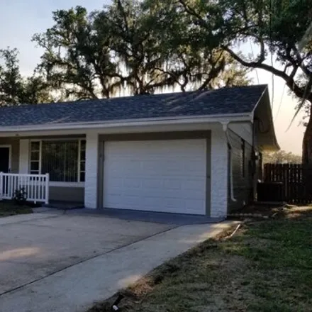Rent this 3 bed house on 64 Holiday Lane South in Titusville, FL 32796