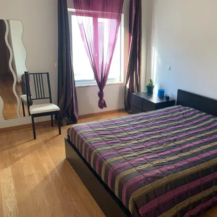 Rent this 2 bed room on Rua General Massano de Amorim in 1300-006 Lisbon, Portugal