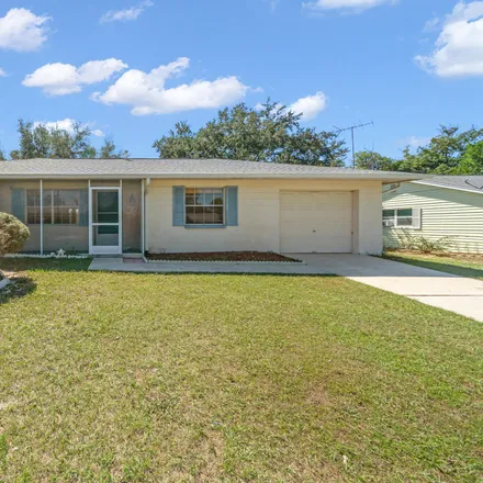 Buy this 2 bed house on 12472 Corrine Avenue in Spring Hill, FL 34609