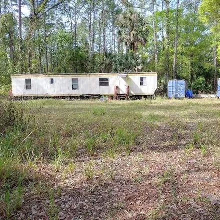 Buy this studio apartment on 2230 Maple Street in Flagler County, FL 32110