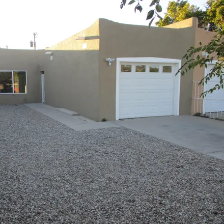 Buy this 3 bed townhouse on 533 Alcazar Street Southeast in Albuquerque, NM 87108