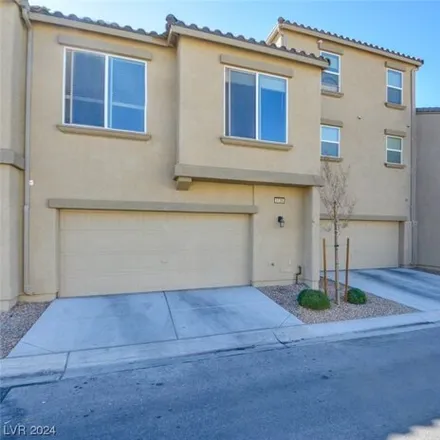 Buy this 4 bed townhouse on 5113 Silica Chalk Avenue in Nellis, NV 89115