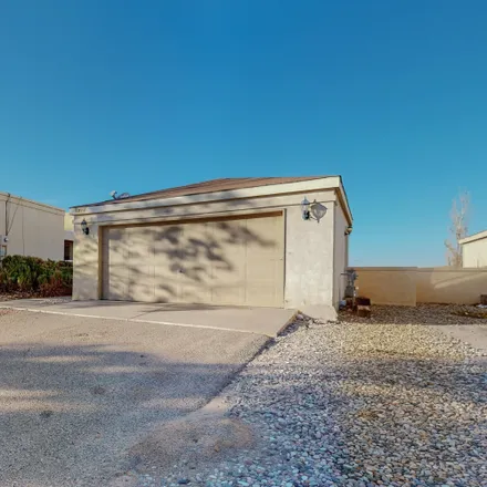 Buy this 2 bed house on 1817 Peach Road Northeast in Rio Rancho, NM 87144