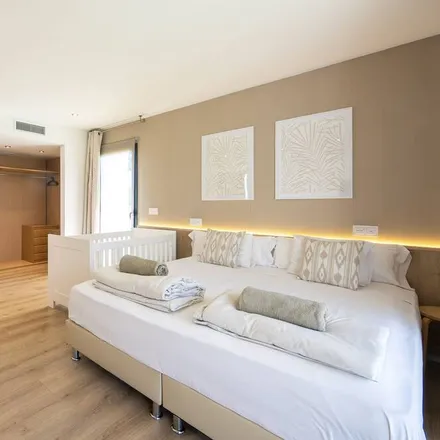 Rent this 6 bed house on Passeig de Calvià in 07180 Urbanització Galatzó, Spain