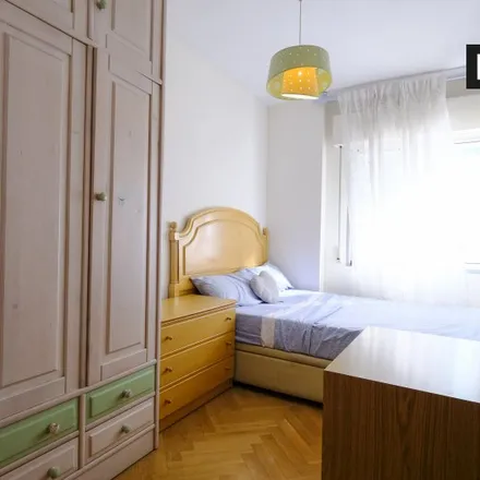 Rent this 4 bed room on Madrid in Calle de Ignacio Santos Viñuelas, 28021 Madrid