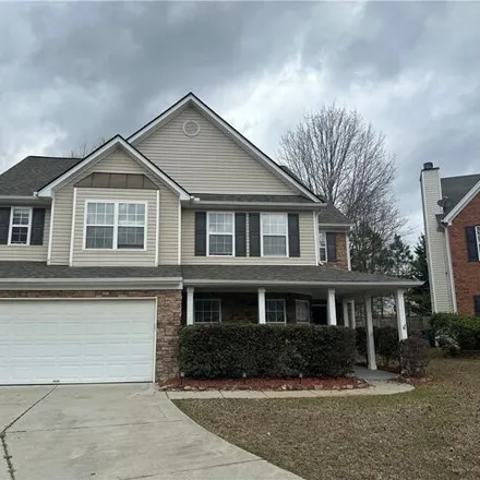 Rent this 4 bed house on 3999 Bogan Mill Northeast Road in Gwinnett County, GA 30519