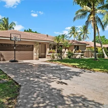 Buy this 4 bed house on 4916 Northwest 59th Way in Coral Springs, FL 33067