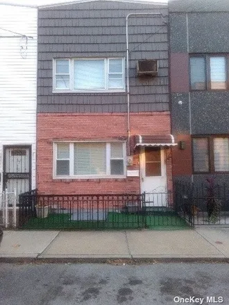 Buy this 3 bed house on 57-09 59th Street in New York, NY 11378