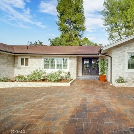 Buy this 5 bed house on 4728 Del Moreno Drive in Los Angeles, CA 91364