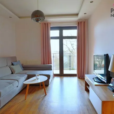 Rent this 2 bed apartment on Podgórna 72a in 87-100 Toruń, Poland