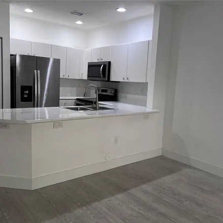 Rent this 3 bed apartment on 5737 Northwest 114th Path in Doral, FL 33178