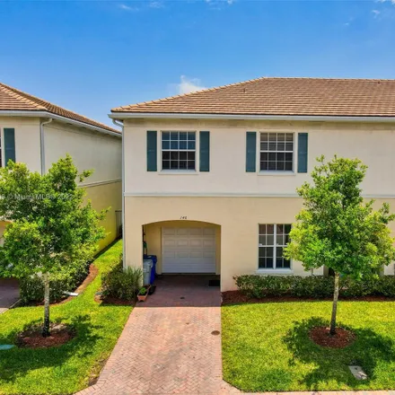 Buy this 3 bed townhouse on 146 Southwest 7th Court in Lyons Park, Pompano Beach