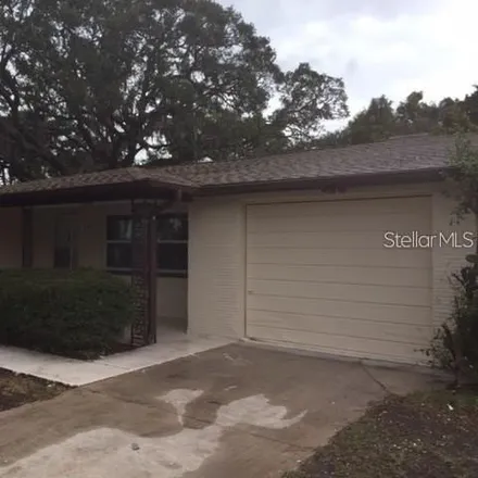 Rent this 3 bed house on 5751 Appletree Road in Holiday, FL 34690