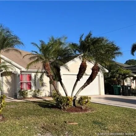 Rent this 4 bed house on 477 Northwest Raymond Lane in Port Saint Lucie, FL 34983