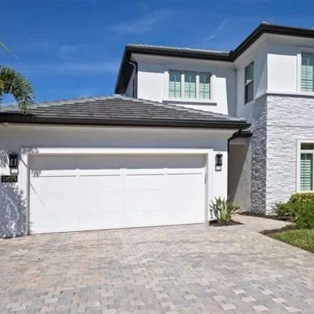 Buy this 4 bed house on 10637 Royal Cypress Way in Orange County, FL 32836