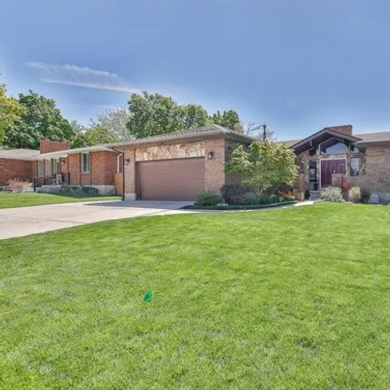 Buy this 6 bed house on 2084 Somerset Drive in Cottonwood Heights, UT 84121
