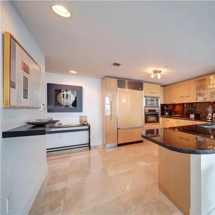 Rent this 2 bed condo on 6801 Collins Ave in Miami Beach, FL