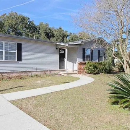 Rent this 2 bed house on 9374 Latham Street in Ferry Pass, FL 32514