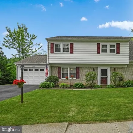 Buy this 4 bed house on 3852 Carriage House Drive in Oakwood Park, Hampden Township