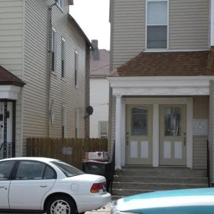 Rent this 3 bed house on 3459 W Diversey Ave Apt 2 in Chicago, Illinois