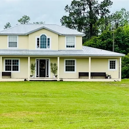 Buy this 5 bed house on 10909 Mattioda Road in Groveland, FL