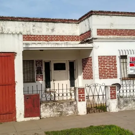 Buy this 3 bed house on Avenida Enrique Victorica 4899 in Lomas de San José, 1744 Moreno